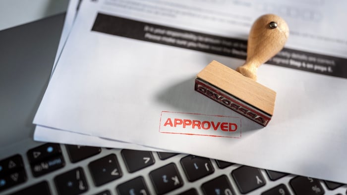 Approved stamp on application form or business agreement document