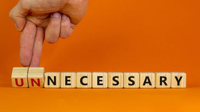 Unnecessary necessary word wooden blocks